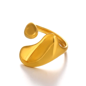 Polished gold irregular fluid ring made of stainless steel with a minimalist chunky design