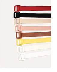 Detail view of colorful wide belts with square buckles in eight different versatile colors