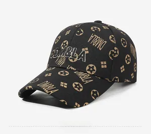 Detail view of black canvas baseball cap with brown star and DM&LA letter embroidery
