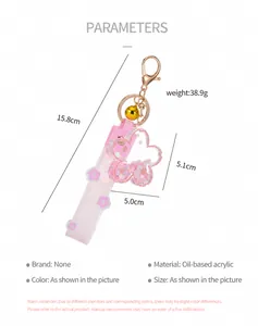 Detailed product specifications of pink cherry blossom liquid keychain with dimensions