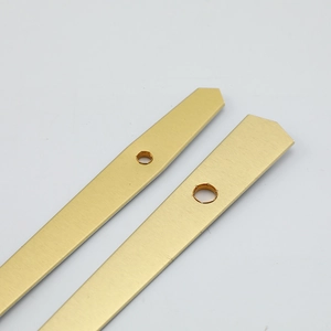 Brushed gold metal clock hands with arrow tips and round mounting holes for DIY quartz clocks