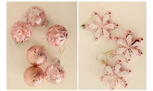Detailed view of pink textured Christmas balls and glitter snowflake ornaments set
