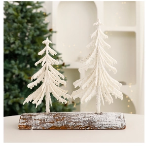 Detail of dual flocked white mini Christmas trees on a rustic natural wooden base