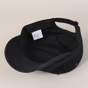 Detail of black cotton cadet cap showing the inner lining and official size label