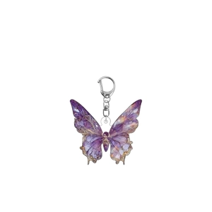 Acrylic purple butterfly keychain with artistic gold textures and silver lobster clasp