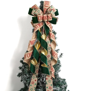 Detailed Christmas tree topper bow with Merry Christmas lettering and star patterns