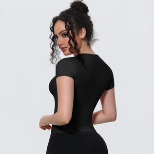Slim fit black yoga tee featuring breathable elastic fabric and athletic back silhouette