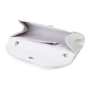 Internal view of white clutch bag showing main compartment, side pocket, and metal rings
