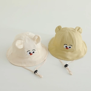 Cute baby sun hat with bird embroidery and 3D bear ears in beige and yellow tones