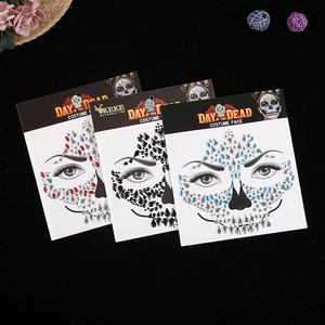 Three packs of Day of the Dead face rhinestone stickers in red, black, and blue sets