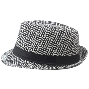 Close-up of the breathable straw fedora with black and white houndstooth weave detail