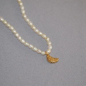 French vintage style freshwater pearl necklace with a gold croissant coin pendant