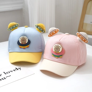 Detail of color-block baby baseball caps with cute 3D bear UFO patch and spaceship ears