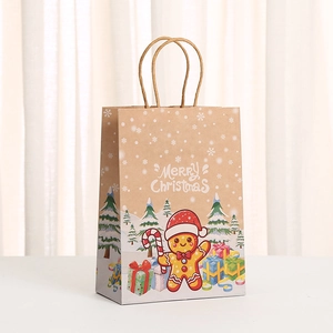 Brown kraft paper Christmas gift bag with gingerbread man and festive holiday prints