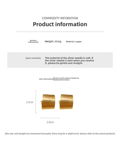 Detail view of gold-plated geometric C-shape earrings with 2.9cm x 2.6cm dimensions