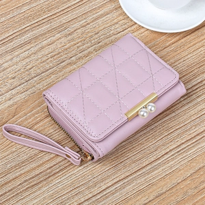 Short quilted lavender tri-fold wallet for women with pearl accent and wrist strap