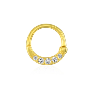 Macro detail of gold hinged hoop ring with five sparkling cubic zirconia stones
