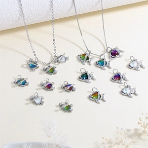 Colorful crystal fish and heart pendants on 18K gold plated necklace with zircon accents