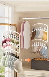 Space-saving white multi-clip hanger for drying and organizing baby socks and small clothes