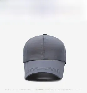 Close-up of dark grey quick-dry baseball cap with sports print and reinforced stitching