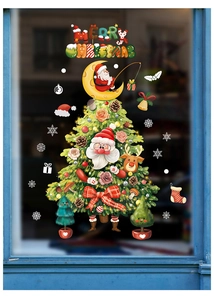 Christmas window decals with Santa and tree motifs on a blue window frame glass