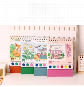 Detail of spiral watercolor book with built-in paint palette showing 20 pages design