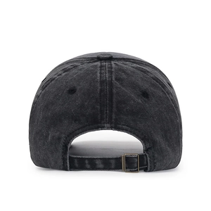 Back view of washed black denim baseball cap featuring adjustable metal buckle strap