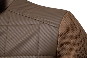 Close-up of diamond quilted texture and knit material stitching on brown jacket