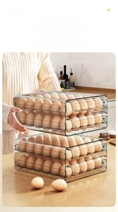 Detail of drawer-type stackable egg storage box with clear multi-layer plastic design