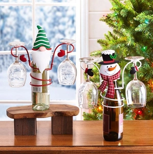 Christmas snowman and gnome metal wine bottle and glass holders with holiday decor