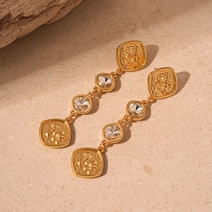 Baroque style gold plated drop earrings featuring lion crest and square cut crystals