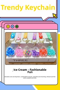 Set of six popsicle acrylic keychains with colorful liquid filling and fruit sequins