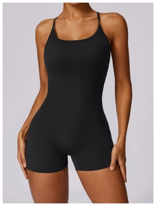 Close-up of black quick-dry sports bodysuit with thin straps and sleek fit