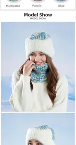 Detail of warm knitted hat and scarf set with thick faux fur trim in outdoor winter setting