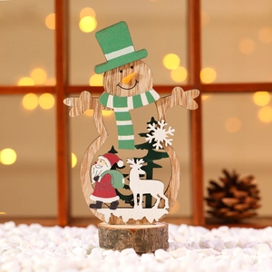 Detail of wooden snowman ornament with top hat and carved forest scene silhouette