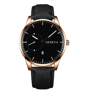 Detail of rose gold case and black matte dial with date window on a quartz watch