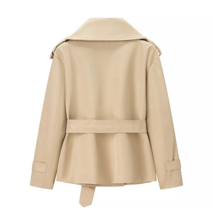 Back view of short khaki trench coat featuring adjustable waist belt and shoulder straps