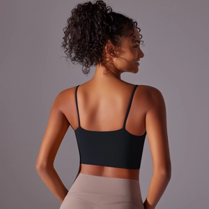 Detailed back view of a black high-intensity sports bra with sleek U-shaped open back design