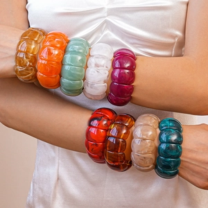 Chunky acrylic geometric stretch bracelets set in various vibrant marble colors