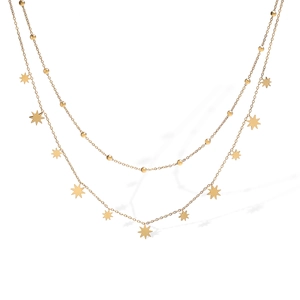 Detail of 18K gold-plated double-layer necklace with star pendants and metal beads