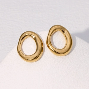 Minimalist gold irregular hollow oval geometric stud earrings with metallic finish