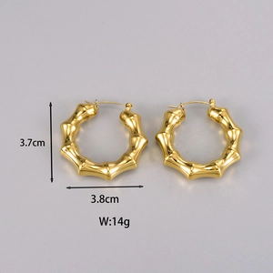 Detailed view of bamboo style gold earrings with 3.7cm height and 3.8cm width measurements
