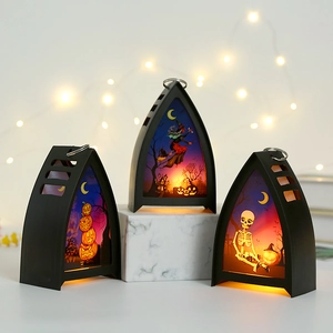 Lanterne di Halloween con temi di strega scheletro e zucca e calda luce LED decorativa