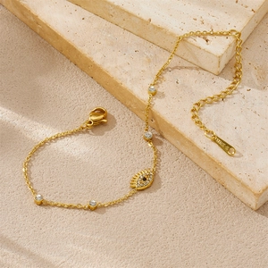 Gold plated stainless steel Evil Eye bracelet featuring sparkling white zircon stones