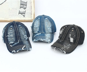 Detailed trio of vintage distressed denim baseball caps in dark blue, light blue, and black