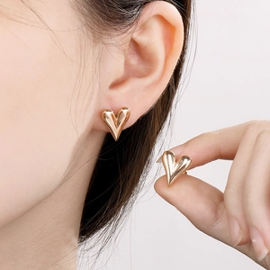 Chic 18K gold plated heart stud earrings in polished stainless steel for women