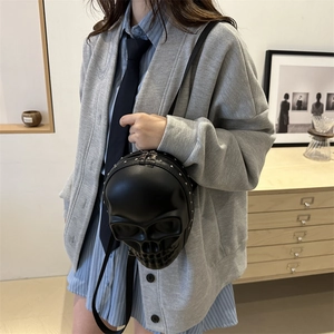 3D gothic skull backpack with silver studs and chain straps for a dark aesthetic look