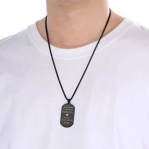 Detail of black military tag necklace with sentimental engraving for Father's Day gift