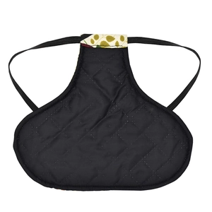 Detail showing black quilted poultry saddle with diamond stitching and elastic straps