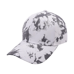Close-up of fabric texture on white and grey tie-dye baseball cap with curved brim